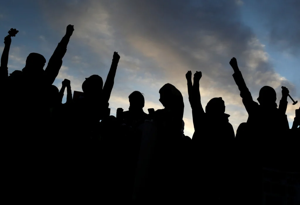 Protesters raising fists